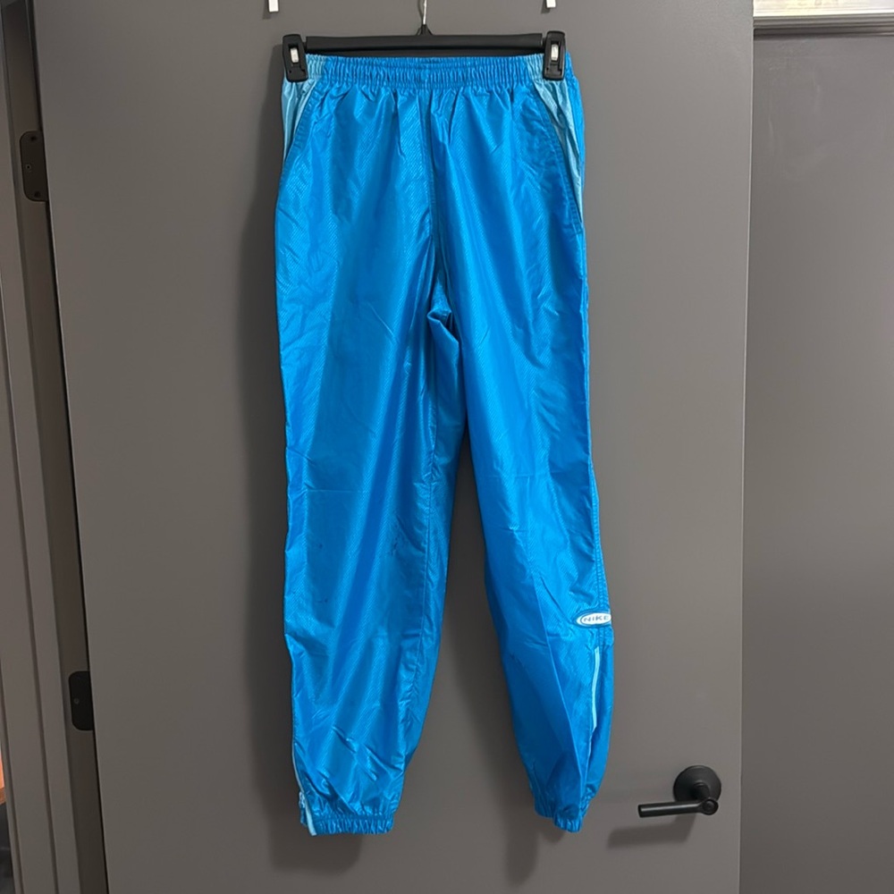 Blue Nike windbreakers